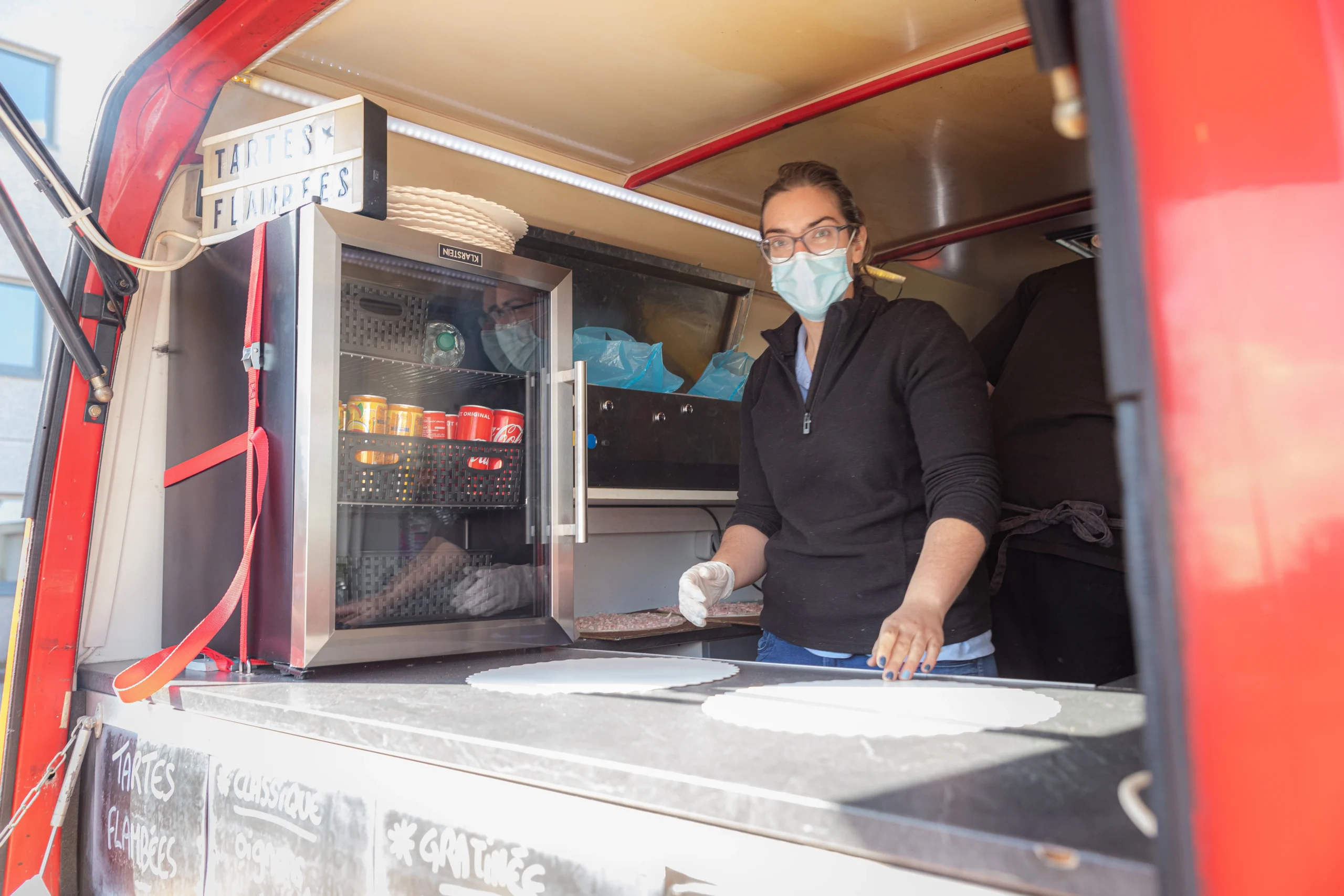 Corporate food truck event Montreal outdoor terrace Vieux-Port employees in line · INNOV'events corporate event planning