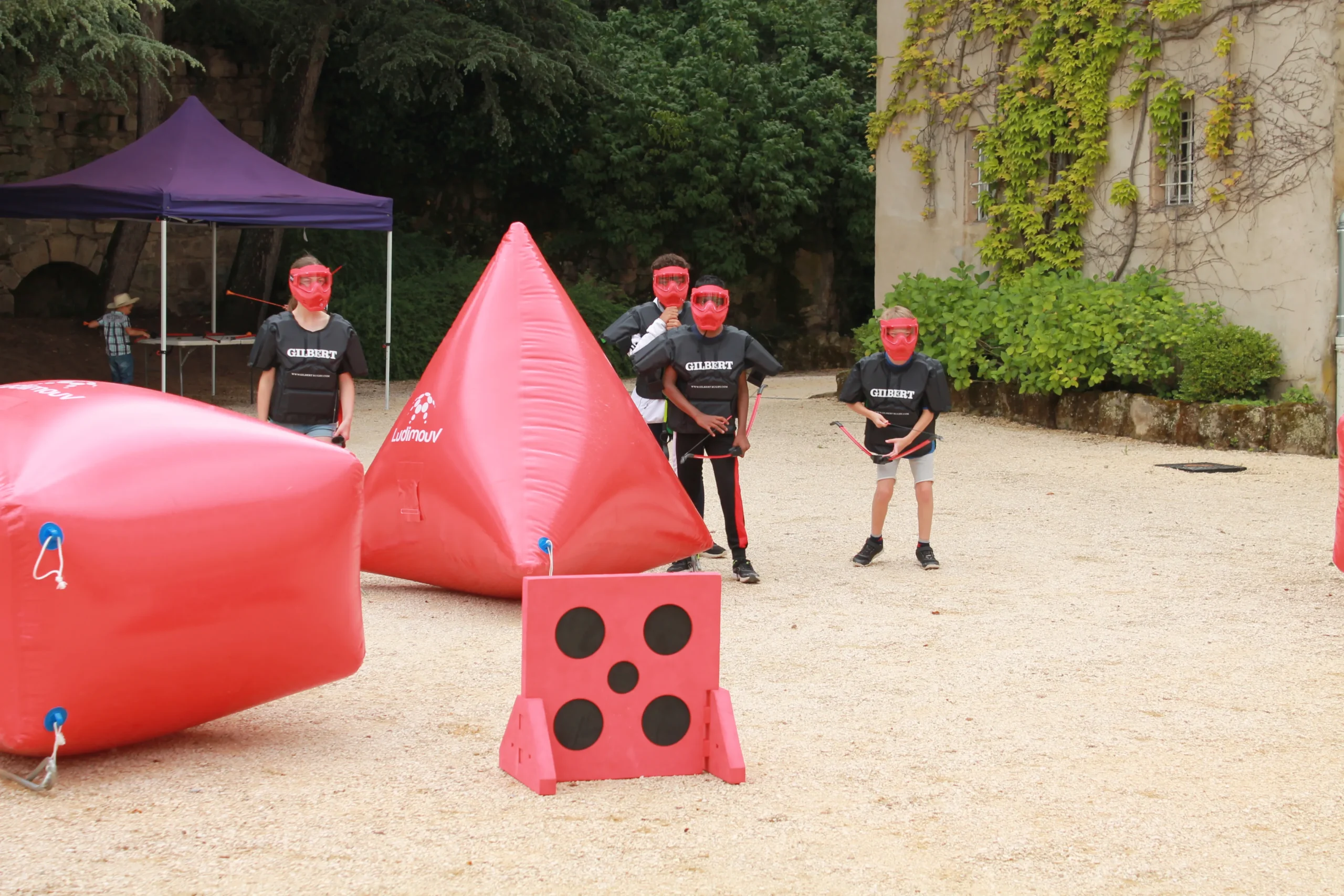 Multi-activity corporate archery Laval station rotation large group · INNOV'events