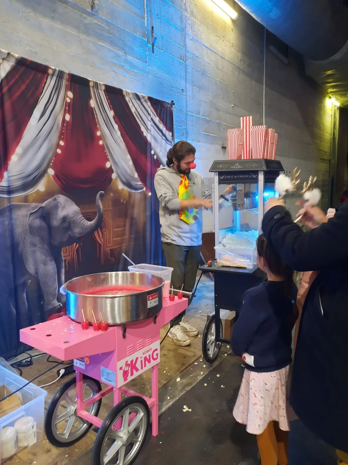 Evening fair under a tent in Quebec with midway games and lighting · INNOV'events