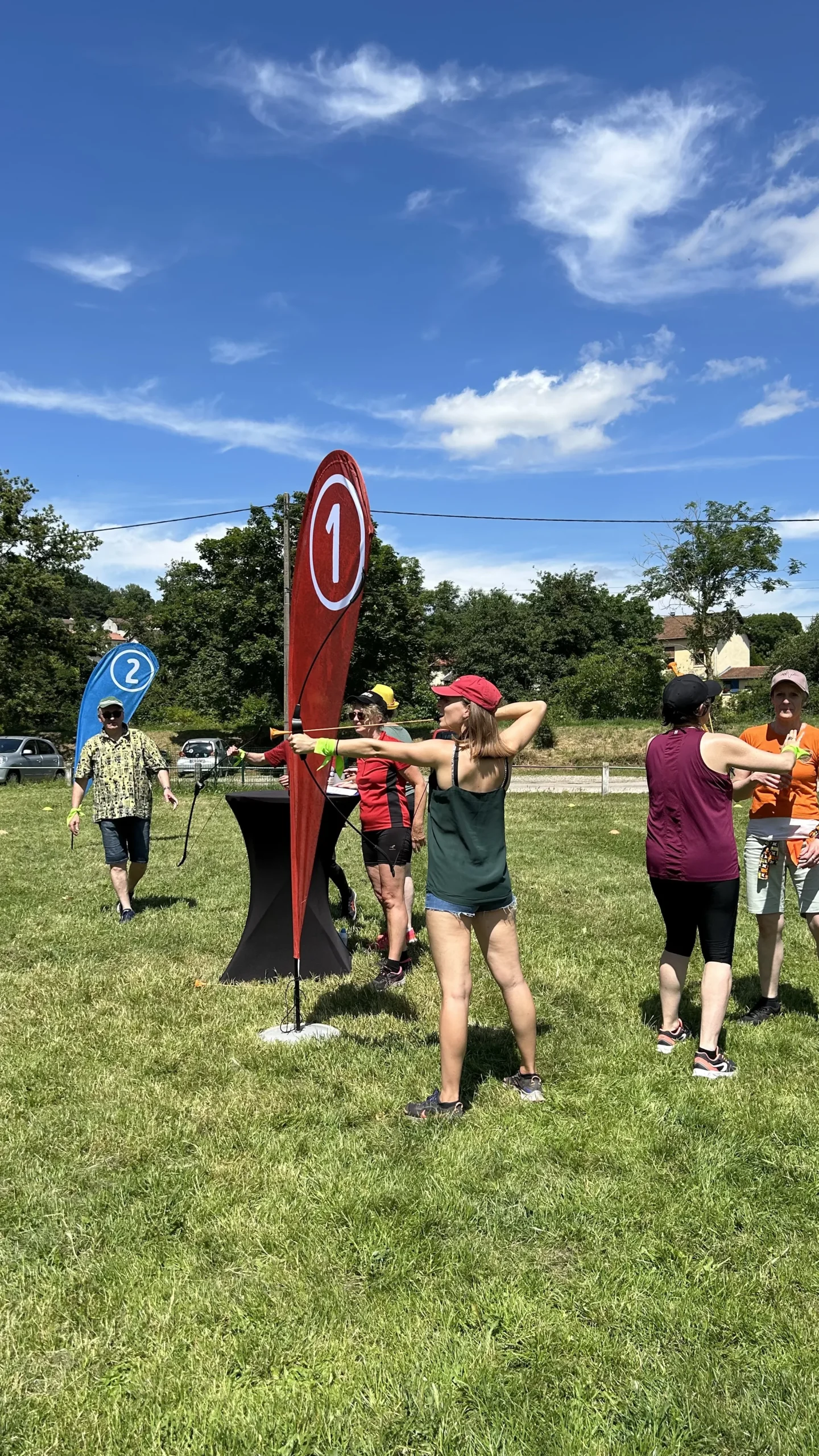Corporate archery Laval evening trophy presentation teams gathered · INNOV'events