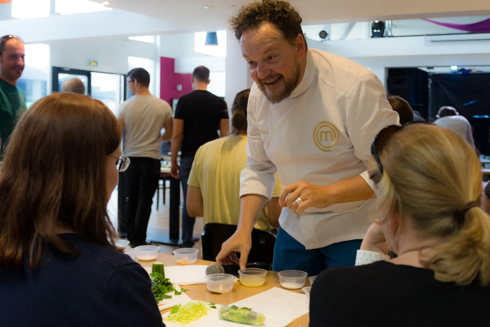 Molecular gastronomy workshop Laval spherification of an olive in progress on a work surface · INNOV'events