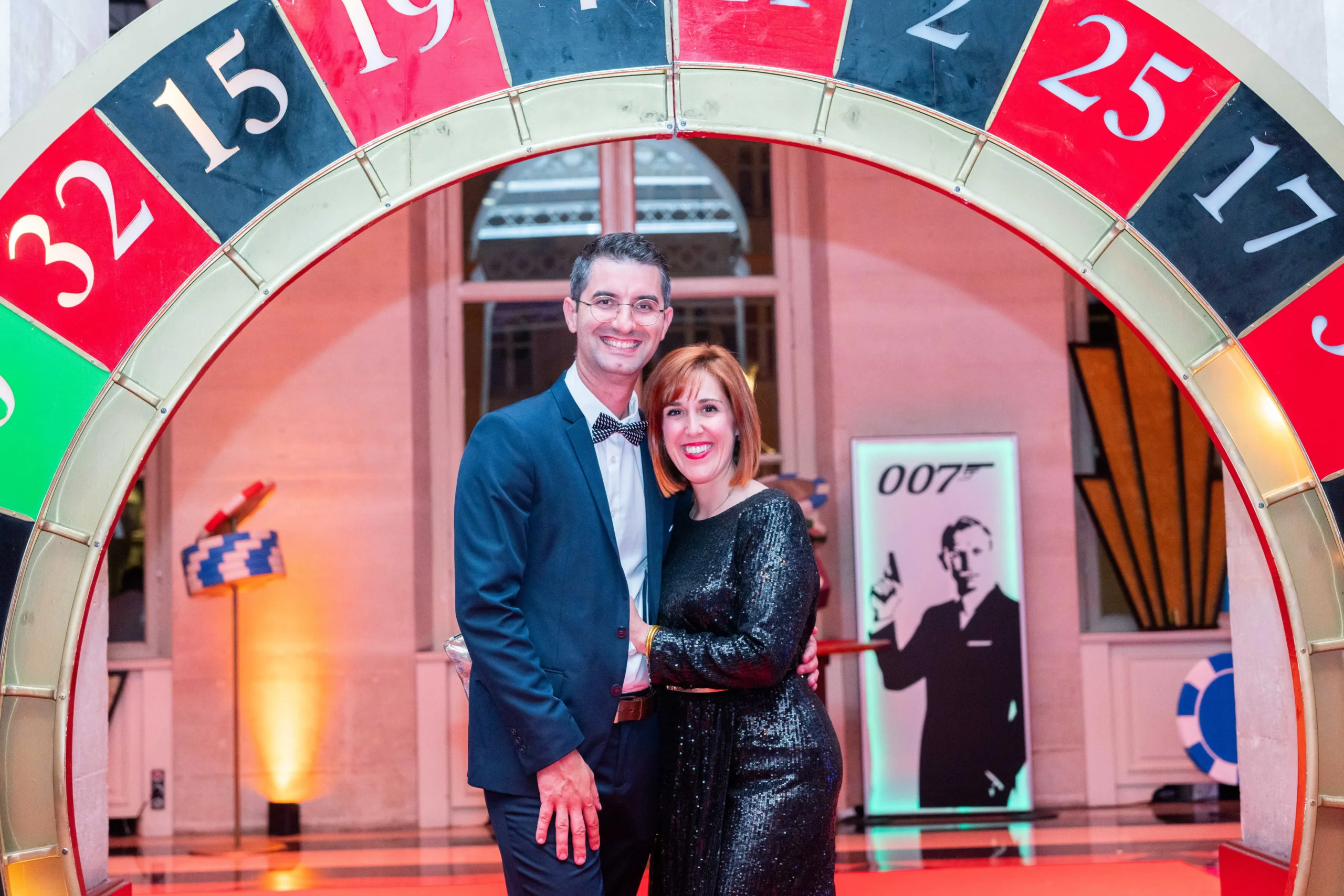 Casino night Montreal employees around blackjack table dim lighting · INNOV'events
