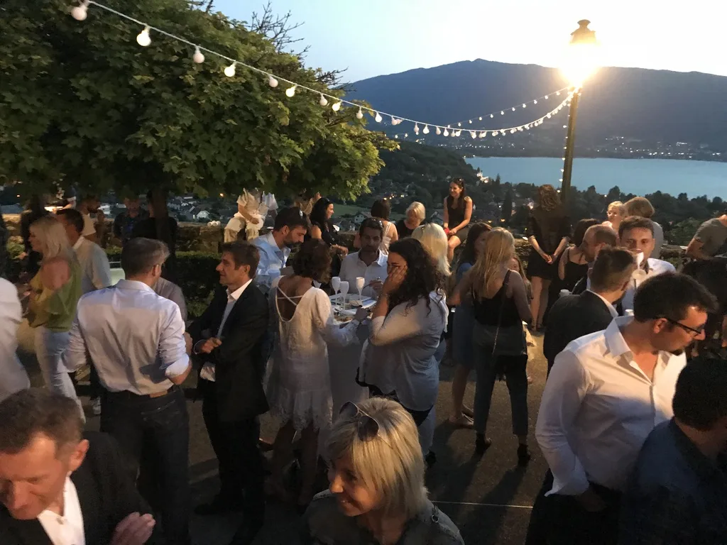 Employee party Laval riverside marquee summer evening · INNOV'events event management