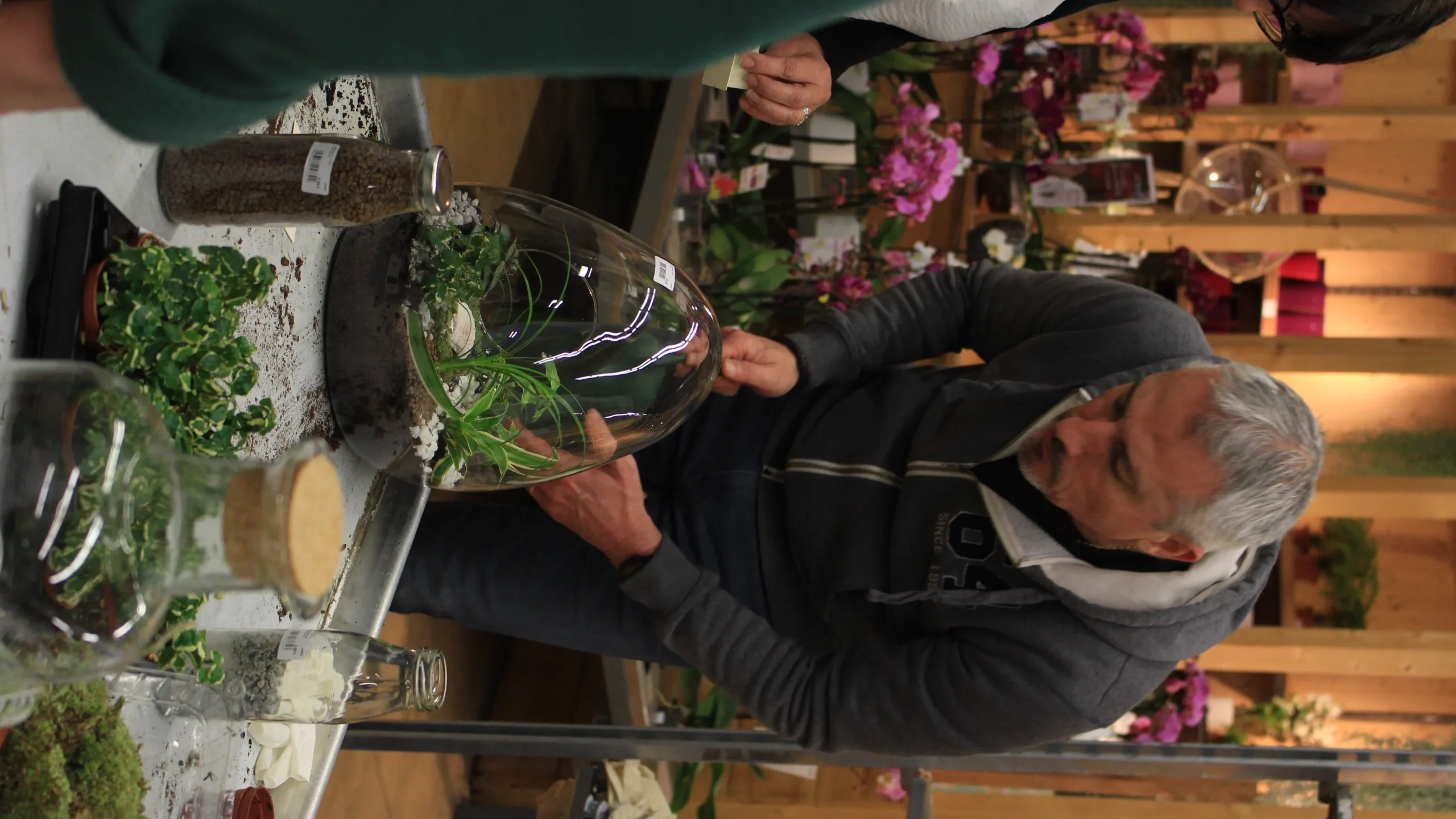 Perfume-making workshop in Laval, participant smelling a final olfactory accord · INNOV'events