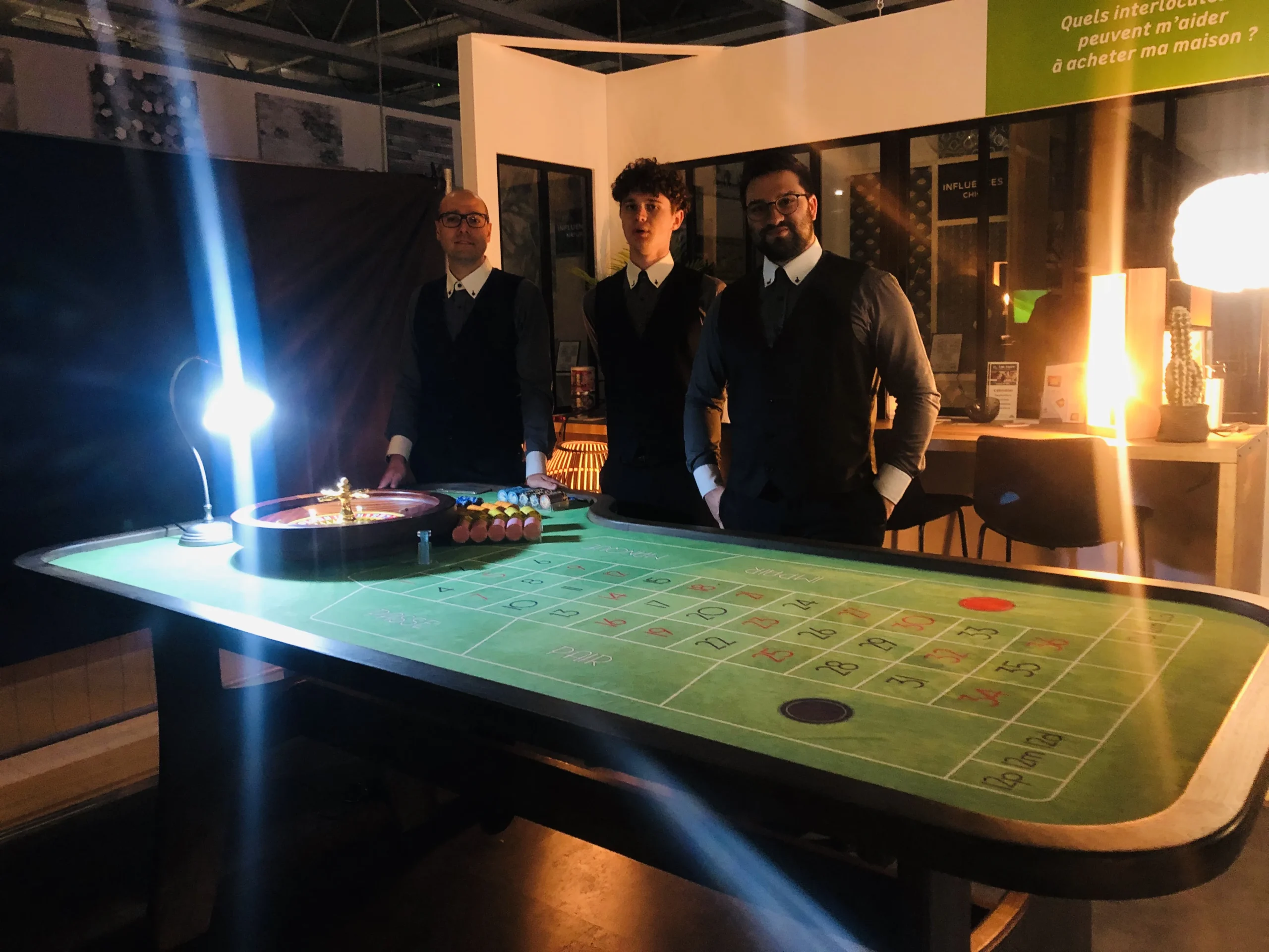 Wine casino in Laval, sommelier presenting a bottle to an attentive group of employees · INNOV'events