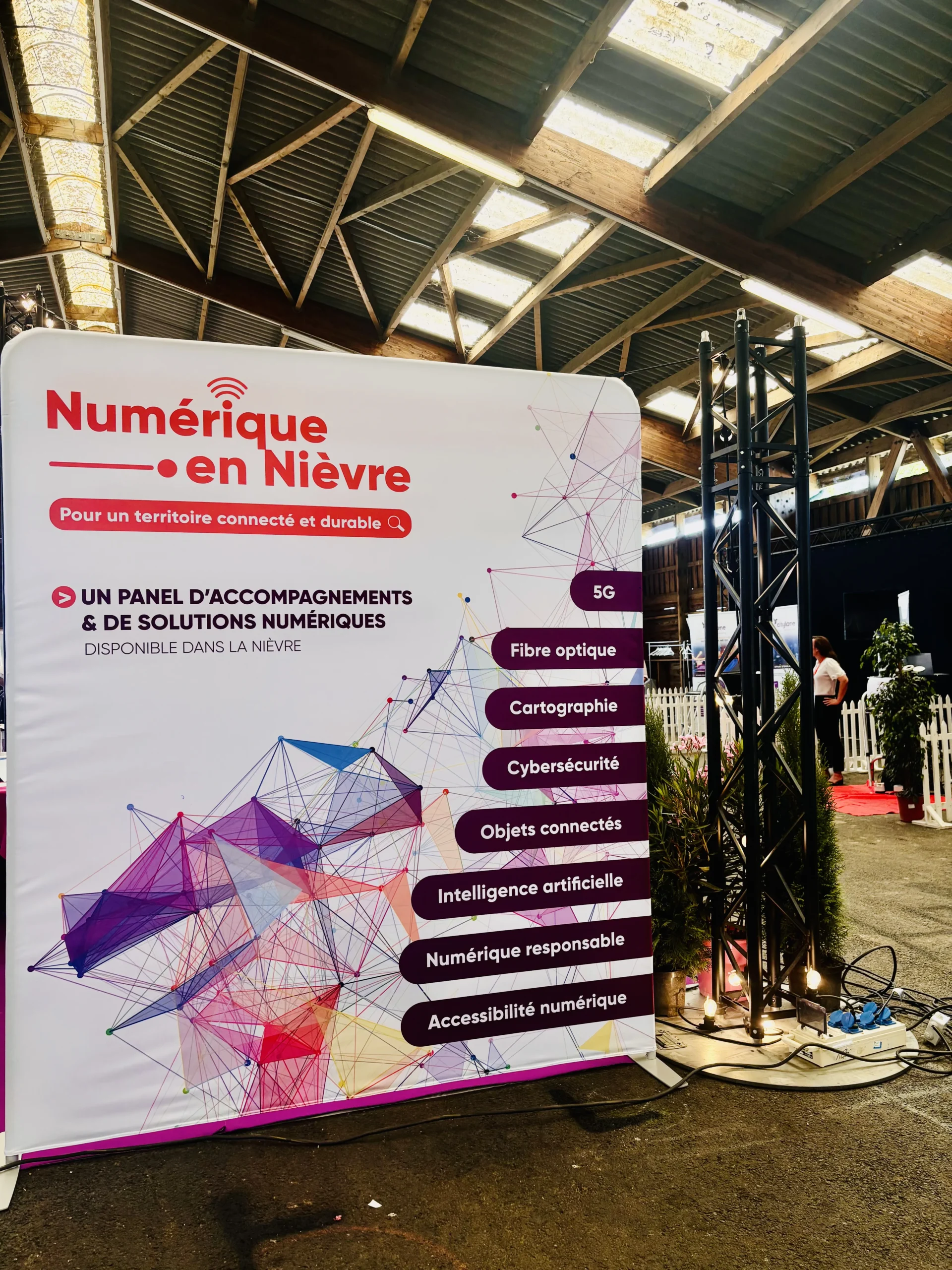 Promotional materials display booth in a Laval convention hall · INNOV'events