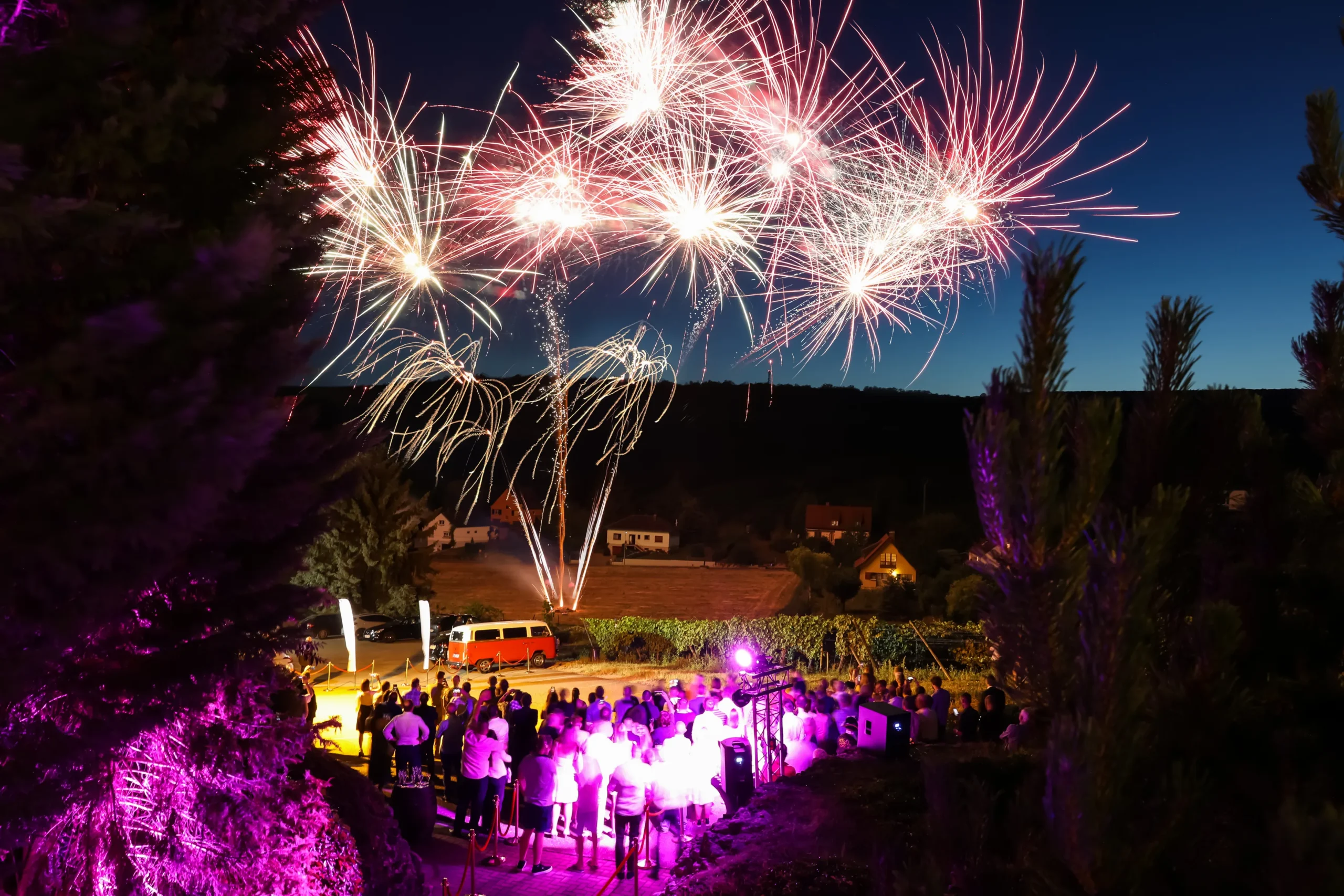 Corporate evening in Laval with multicoloured fireworks along the riverbank · INNOV'events event planning