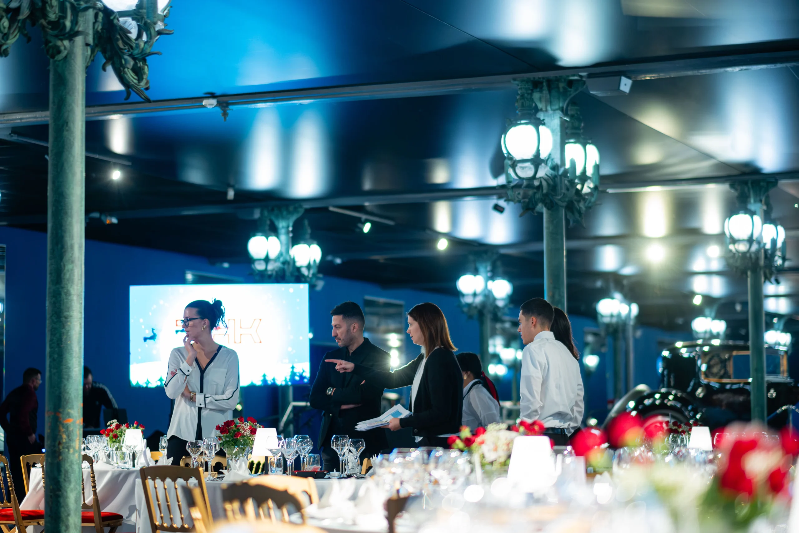 Corporate team dinner Montreal themed evening Quartier des spectacles stage lighting · INNOV'events