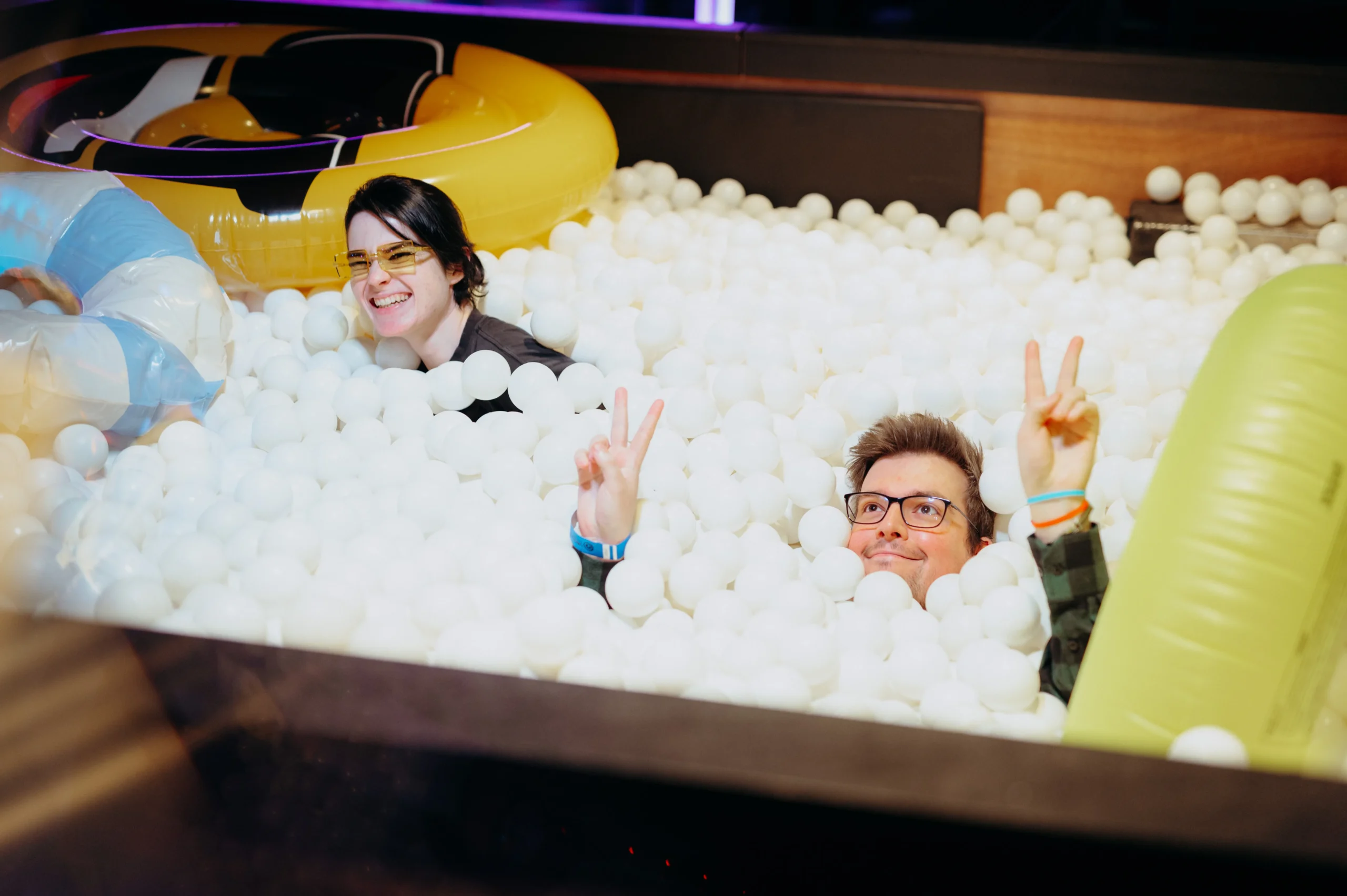 Corporate ball pit Montreal evening event coloured lighting Arsenal art contemporain · INNOV'events