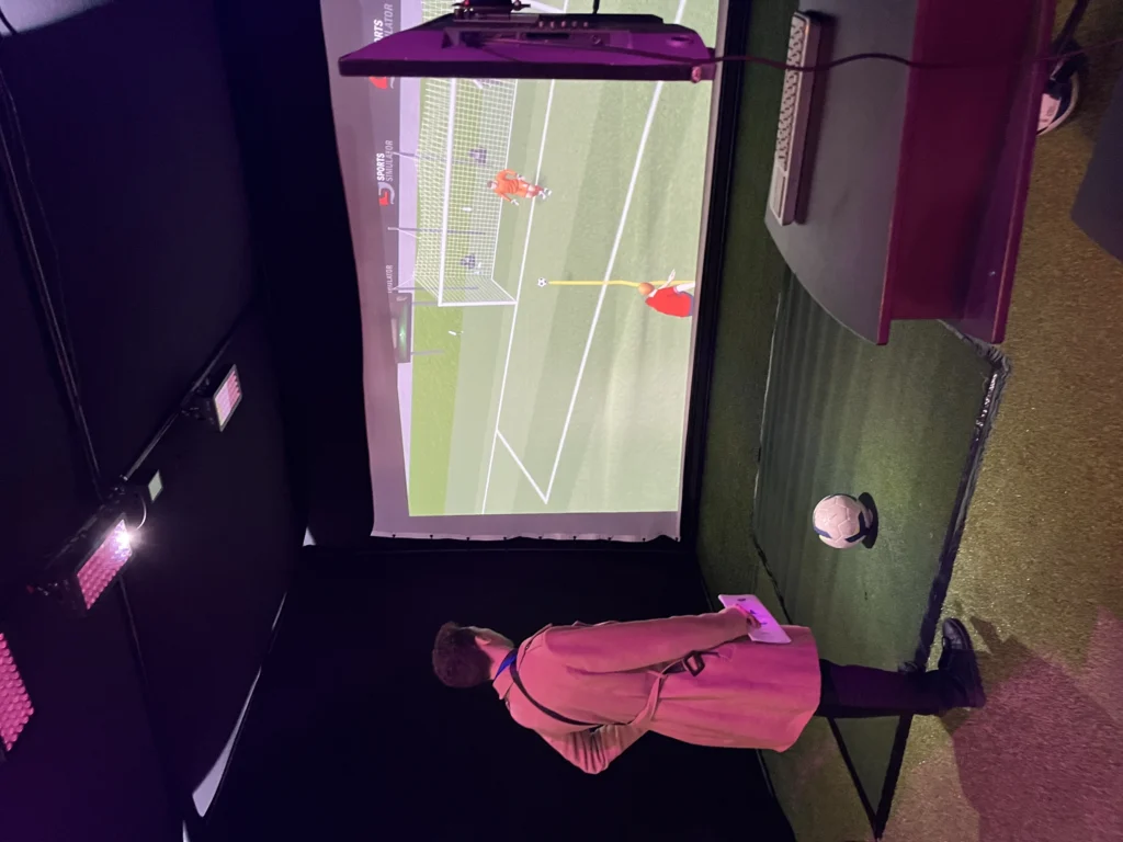 Plan a corporate soccer simulator event in Quebec.