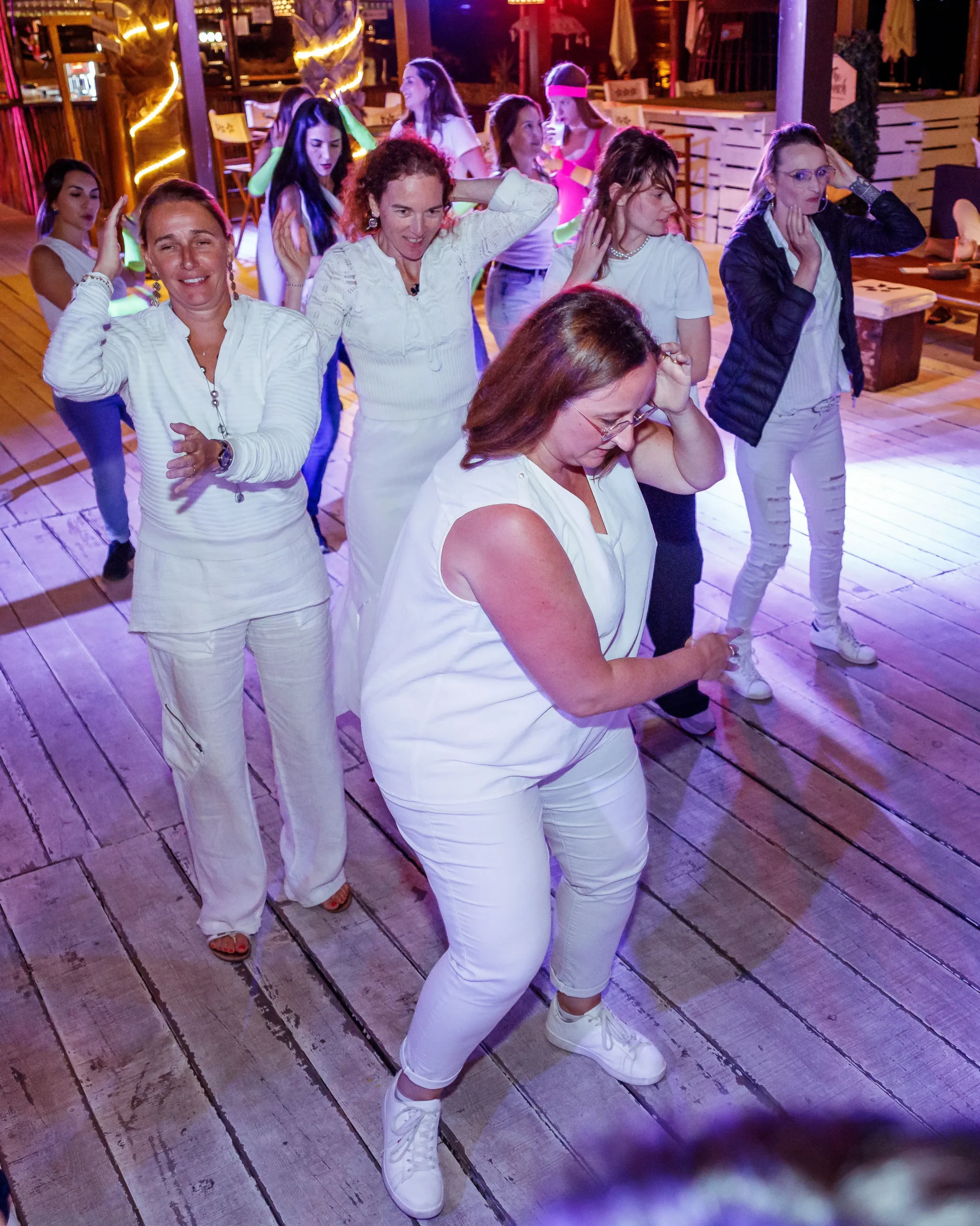 Corporate summer party Laval round tables outdoors by the river teams dining · INNOV'events