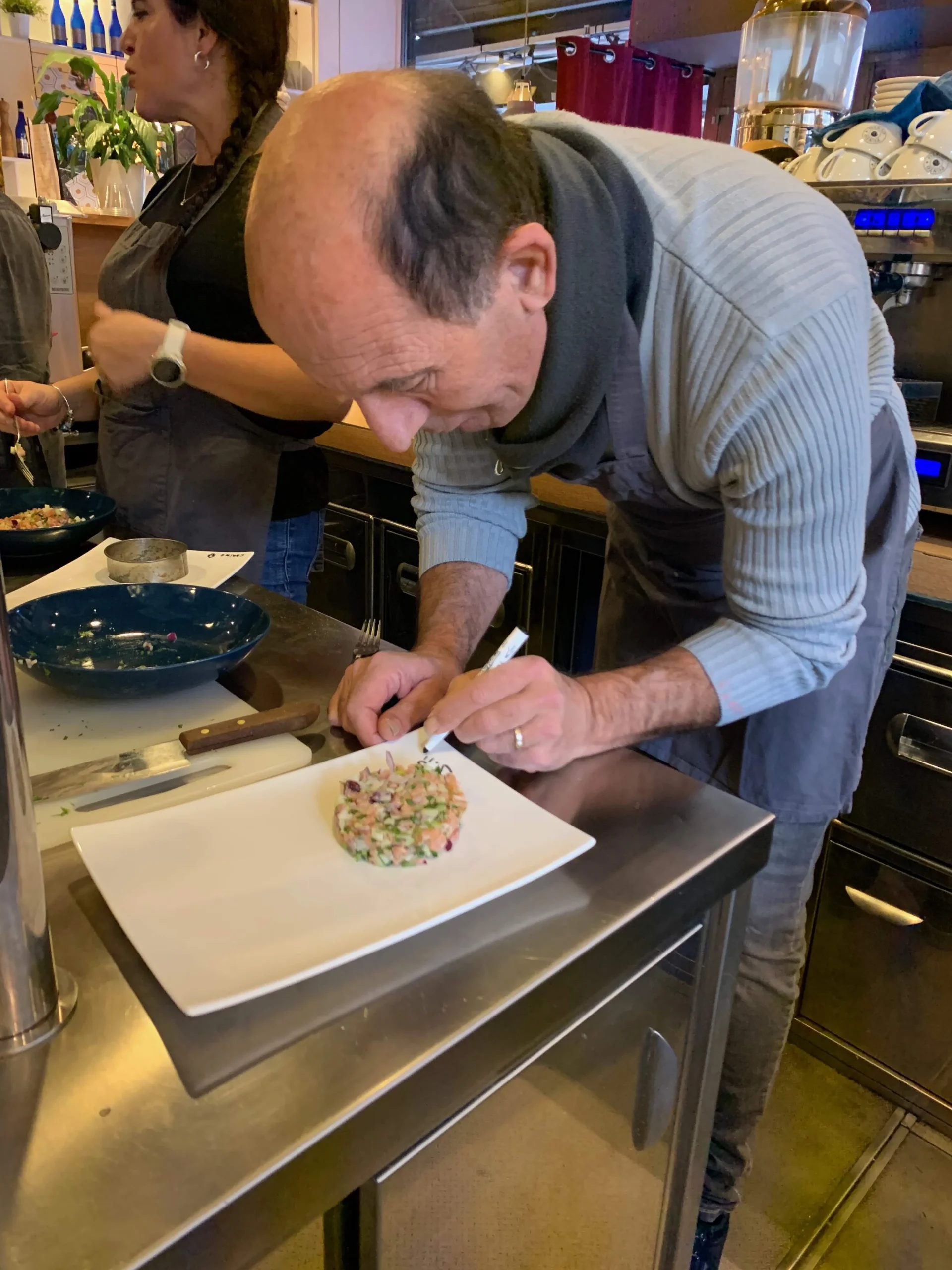 MasterChef-style culinary workshop in Laval, head judge announcing the surprise ingredient · INNOV'events